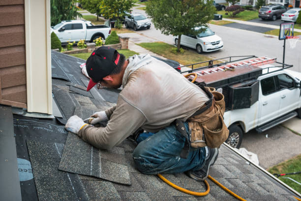 Professional Roofing technician working in Low Moor, VA